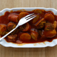 A typical German fast food dish of 'Currywurst', which is a sausage with curry powder and ketchup served is pictured at a takeaway in Dortmund